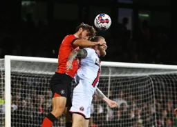 Tom Lockyer and Oli McBernie go head to head