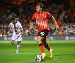 Luke Freeman looks to start an attacking move