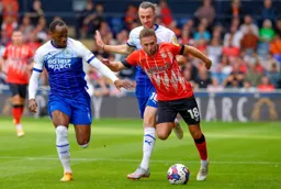 Jordan Clark runs with the ball