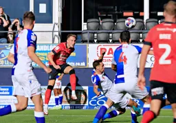 Cauley Woodrow trys a shot at goal