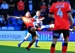 Allan Campbell sticks a foot out