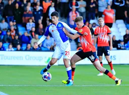 Reece Burke gets to grips with John Buckley