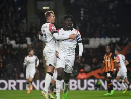 James Bree and Elijah Adebayo look pleased after the Town go 1-0 in front