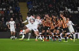 Elijah Adebayo and Reece Burke have a wall of City defenders closing them down