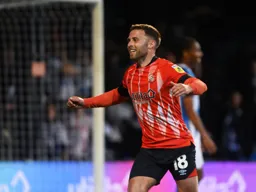 Jordan Clark has just scored the Town`s third goal