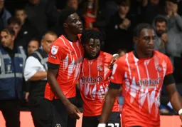 Elijah Adebayo and Fred Onyadinma after Adebayo has just scored his and Town`s second goal