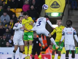 Liam Gibbs graps hold of Dan Potts shirt