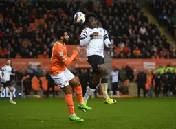 Pelly Ruddock-Mpanzu wins a header head band and all