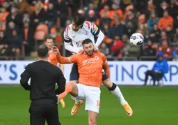 Tom Lockyer gets to grips with Gary Madine