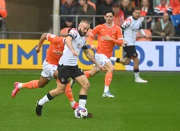 Allan Campbell brings the ball forward