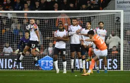 Allan Campbell looks to block Theo Corbeanu`s free kick