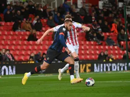 Carlton Morris runs towards the penalty area
