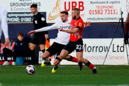 Allan Campbell moves in to make a tackle