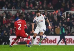 Alfie Doughty side steps Isaiah Jones