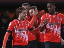 Luke Freeman and Cameron Jerome in deep discussion