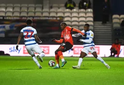 Amari`i Bell is closed down by two Rangers