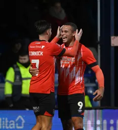 Harry Cornick and Carlton Morris celebrate Cornick`s goal