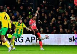 Cameron Jerome controls the ball