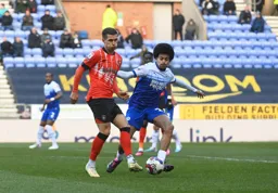 Dan Potts plays a side foot pass
