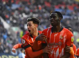 Harry Cornick and Elijah Adebayo celebrate Adebayo`s goal