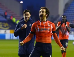 Tom Lockyer celebrates a successful away day