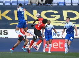 Elijah Adebayo and Steven Caulker turn their backs on the ball