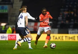 Amari`i Bell knocks the ball past Brad Potts