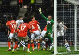 Somehow the ball stays out as the Town pile on the pressure