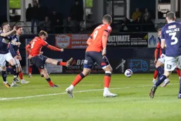 Luke Berry fires in the Town's second goal