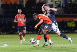 Pelly-Ruddock Mpanzu shields the ball