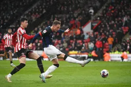 Cauley Woodrow shoots through the rain drops