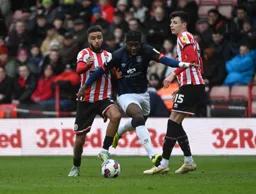 Pelly Ruddock-Mpanzu forces his way through