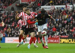Elijah Adebayo controls the ball under pressure