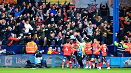 Fans celebrate Gabriel Osho`s goal