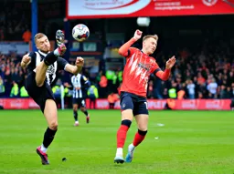 Cauley Woodrow takes evasive action