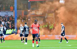 Pelly Ruddock-Mpanzu walks away from the flare