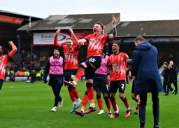 Alfie Doughty leads the post match celebrations