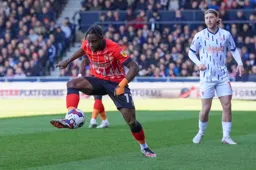 Pelly Ruddock-Mpanzu brings the ball under control