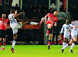Allan Campbell blocks the ball