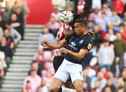 Carlton Morris goes in bravely