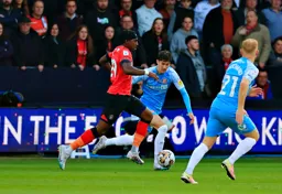 Amari`i Bell drives forward