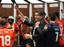 Mick Harford lets the beer flow