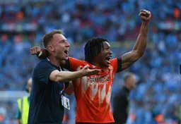 Cauley Woodrow and Gabriel Osho celebrate