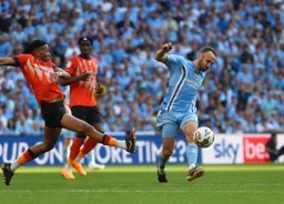 Gabriel Osho lunges into Liam Kelly