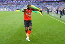 Amari`i Bell with his Jamaica flag