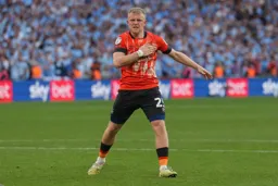 Joe Taylor gets the crowd motivated