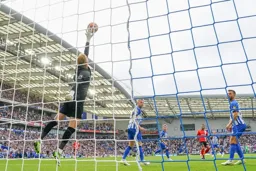 Jacob Brown tests the Albion keeper