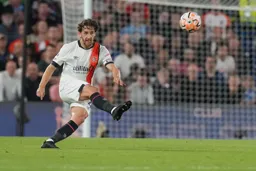 Tom Lockyer Town Captain gets the ball forward