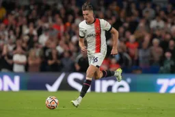 Reece Burke driving forward