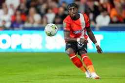 Amari Bell crosses into the box